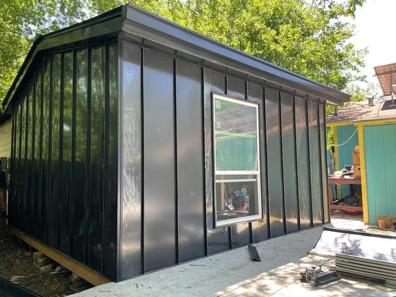 Black standing seam metal wall panels for Metal Roof Installation in Holliston